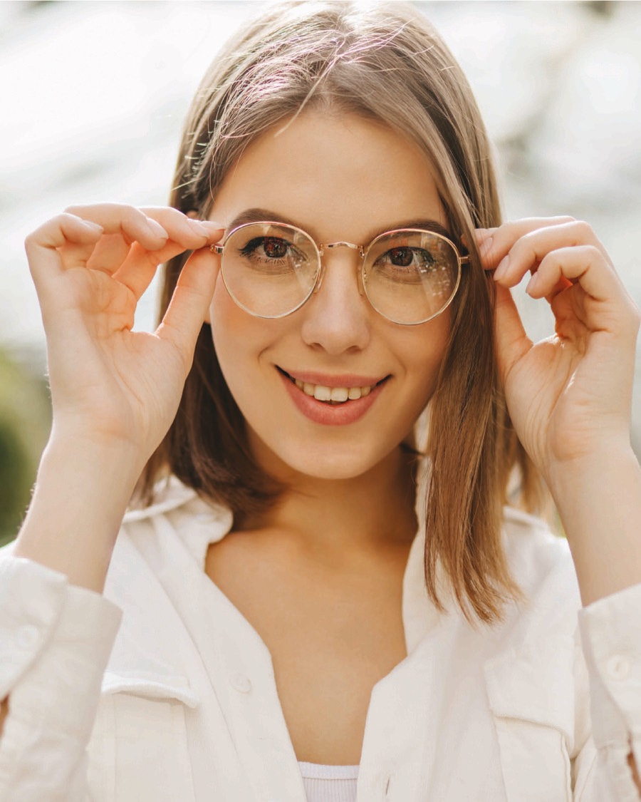 Woman wearing Glatt Series progressive eyeglasses