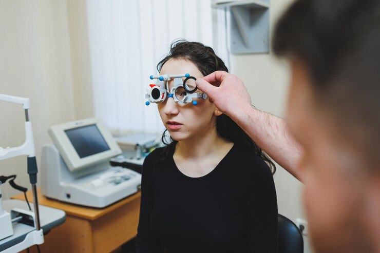 Young woman undergoing an eye examination at an ophthalmologist appointment